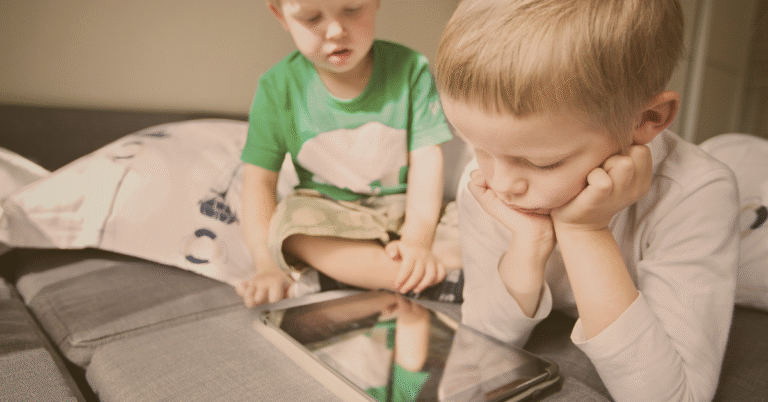 Father setting screen time limits for children with balance and routine